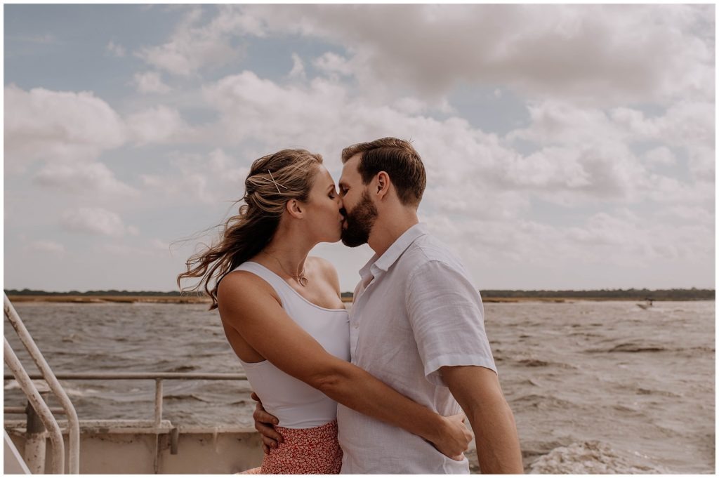 Couple kissing on a ferry