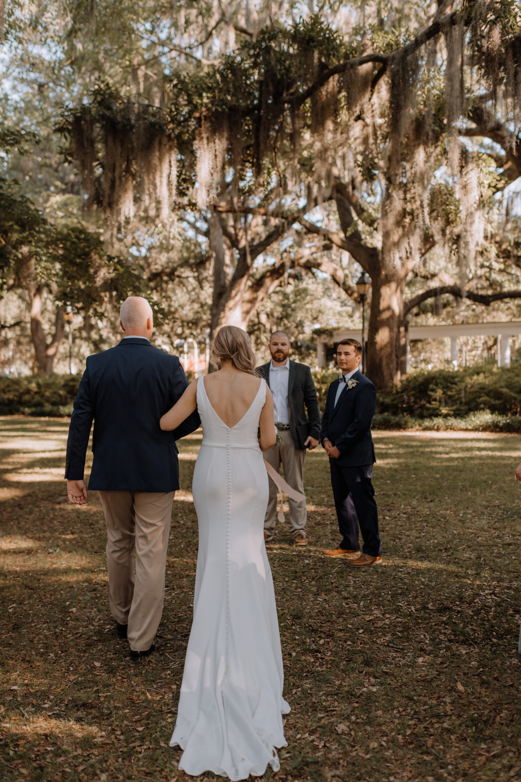 Bride walking down the aisle in Forsyth Park